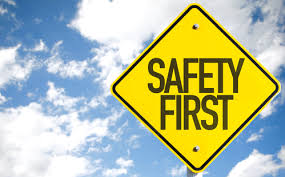 Safety Is a value that is not up for negotiation. Yellow road sign that reads safety first